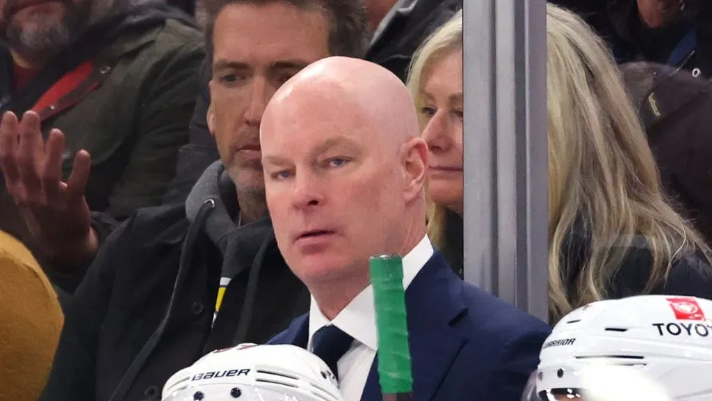 Head coach John Hynes of the Minnesota Wild looks on against the Chicago Blackhawks during the second period at the United Center on February 07, 2024 in Chicago, Illinois.