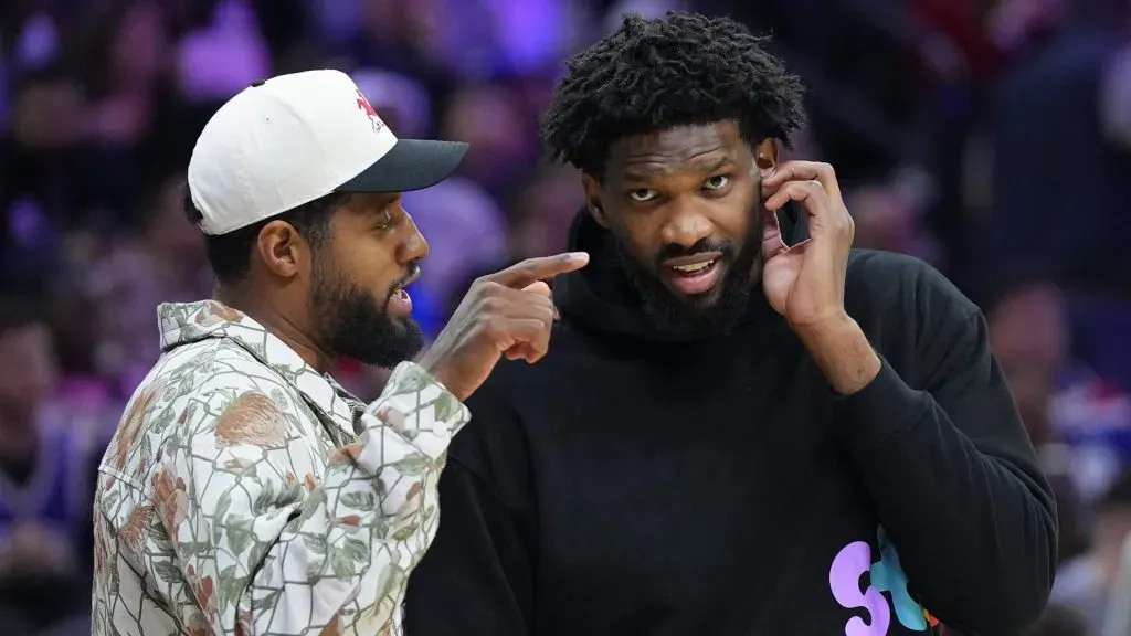 Paul George of the Philadelphia 76ers talks to Joel Embiid