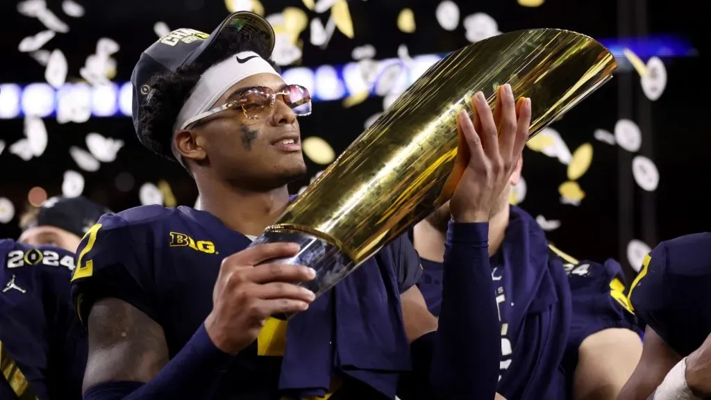 Will Johnson #2 of the Michigan Wolverines celebrates after defeating the Washington Huskies during the 2024 CFP