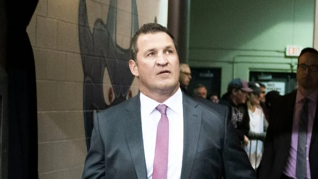 Adam Foote walks to the bench for his first ever WHL game as a head coach for the Kelowna Rockets against the Swift Current Broncos at Prospera Place on October 23, 2018 in Kelowna, Canada.
