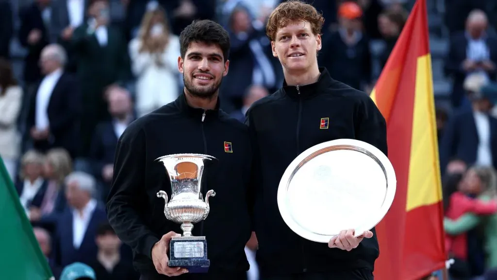 Carlos Alcaraz poses with the trophy as he celebrates victory alongside runner up Jannik Sinner following the Rome Open final. (Dan Istitene/Getty Images)