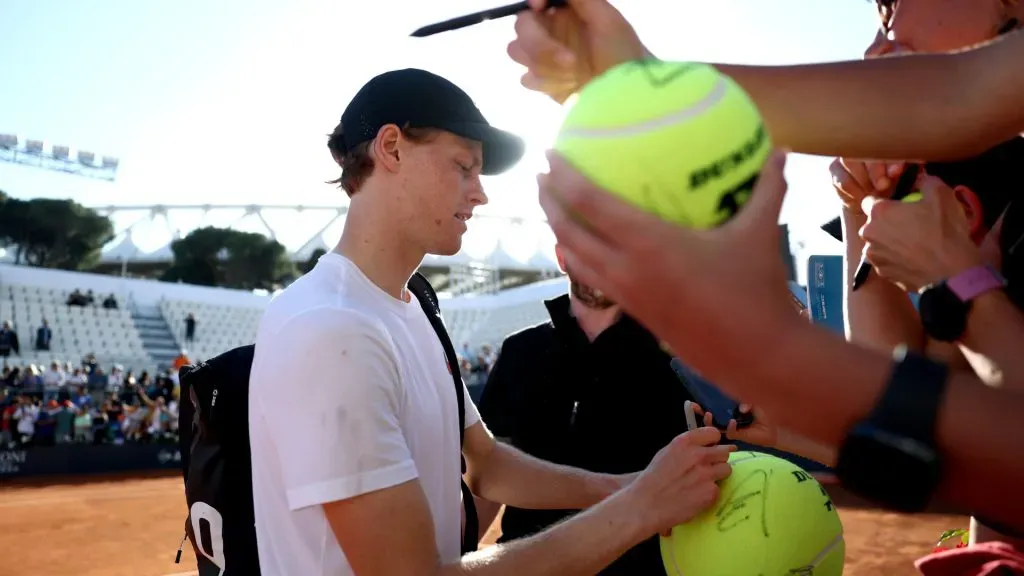 Jannik Sinner of Italy signs autographs for fans following a training session at the Rome Open. (Dan Istitene/Getty Images)