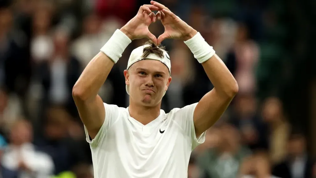 Holger Rune of Denmark celebrates winning match point against Quentin Halys of France in his Gentlemen’s Singles third round match during day six of The Championships Wimbledon 2024. (Source: Francois Nel/Getty Images)