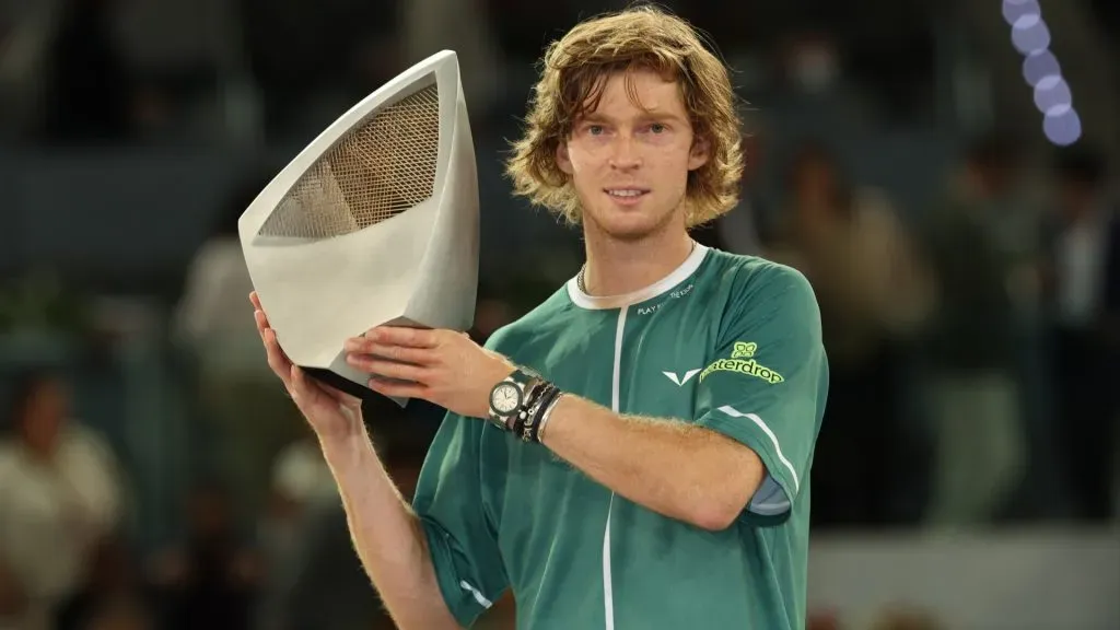 Andrey Rublev lifts the Mutua Madrid Open trophy following victory in the Men’s Singles Final match against Felix Auger-Aliassime on Day Thirteen of Mutua Madrid Open in 2024. (Source: Clive Brunskill/Getty Images)