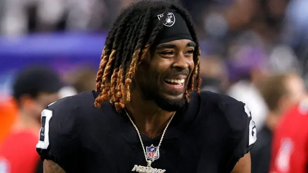 Cornerback Damon Arnette #20 of the Las Vegas Raiders smiles as he walks off the field after the team’s 20-7 victory over the Seattle Seahawks in a preseason game at Allegiant Stadium on August 14, 2021 in Las Vegas, Nevada.