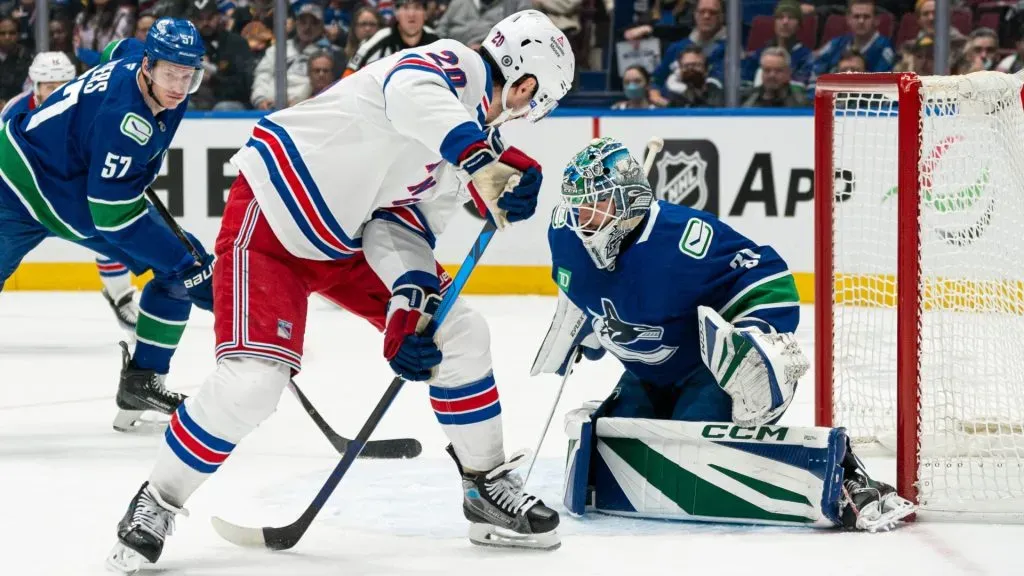 : Chris Kreider #20 of the New York Rangers shoots on goalie Arturs Silovs #31 of the Vancouver Canucks during the first period on November, 19, 2024 at Rogers Arena in Vancouver, British Columbia, Canada. (Photo by Rich Lam/Getty Images)