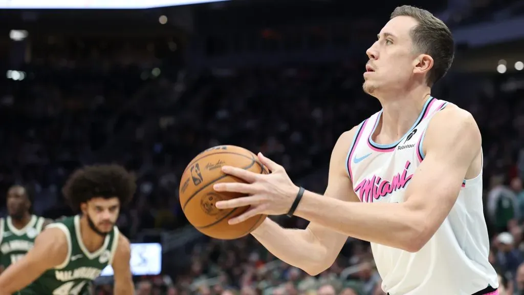 Duncan Robinson #55 of the Miami Heat takes a three point shot during a game against the Milwaukee Bucks. (Stacy Revere/Getty Images