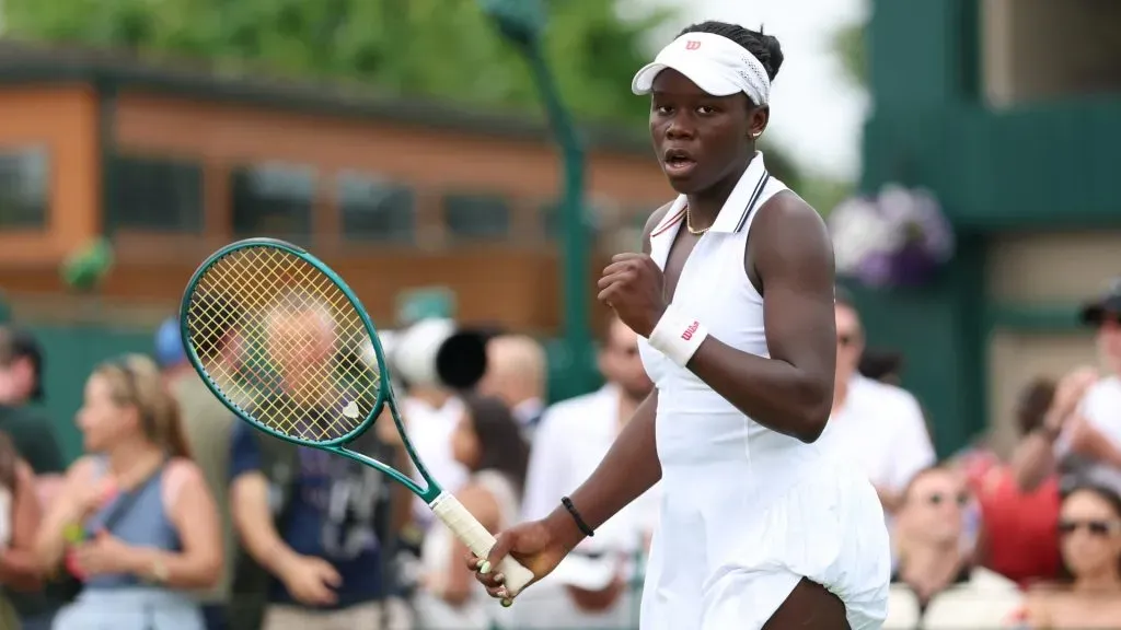 Victoria Mboko of Canada celebrates a point against Magdalena Frech of Poland during the Ladies’ Singles first round match on day two of The Championships Wimbledon 2025. (Source: Dan Istitene/Getty Images)