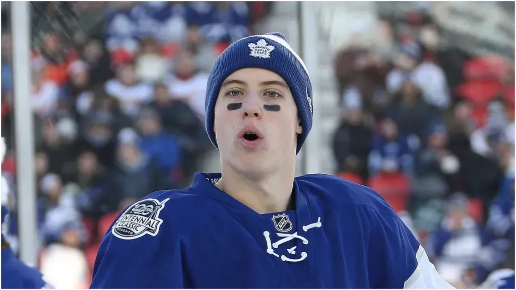 Mitchell Marner #16 of the Toronto Maple Leafs watches a flying puck in the warm-up prior to play against the Detroit Red Wings during the 2017 Scotiabank NHL Centennial Classic at BMO Field On January 1, 2017 in Toronto, Ontario, Canada.