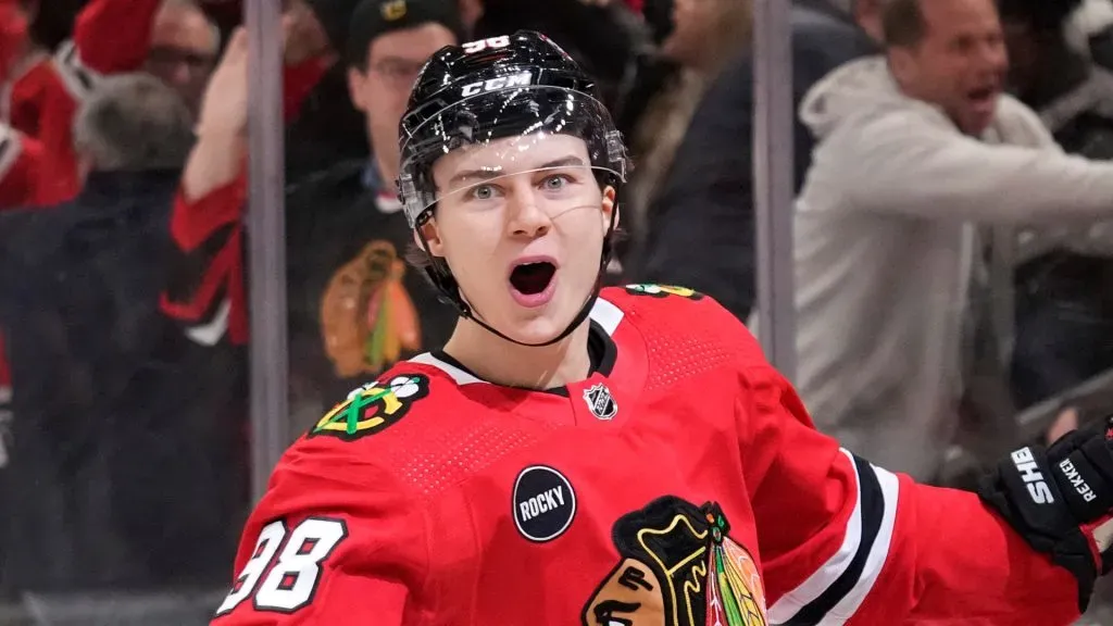 Connor Bedard #98 of the Chicago Blackhawks celebrates after scoring the game winning goal during overtime against the Winnipeg Jets at the United Center on December 27, 2023 in Chicago, Illinois.