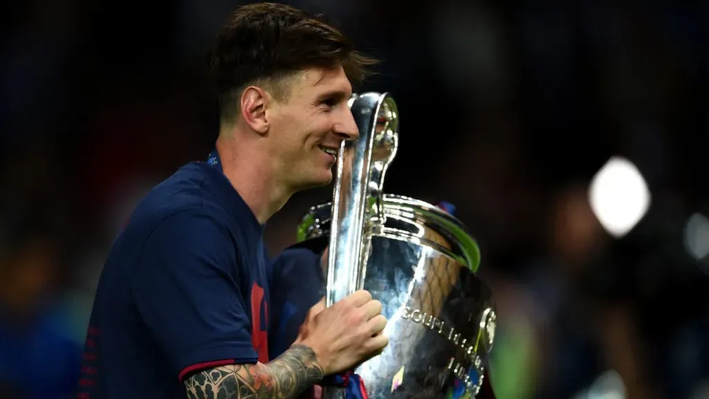 Lionel Messi of Barcelona celebrates with the trophy after the UEFA Champions League Final against Juventus in 2015. (Laurence Griffiths/Getty Images)