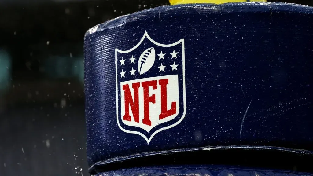 Detail image of the NFL logo on a goal post before the 2015 NFC Championship game. (Source: Ronald Martinez/Getty Images)
