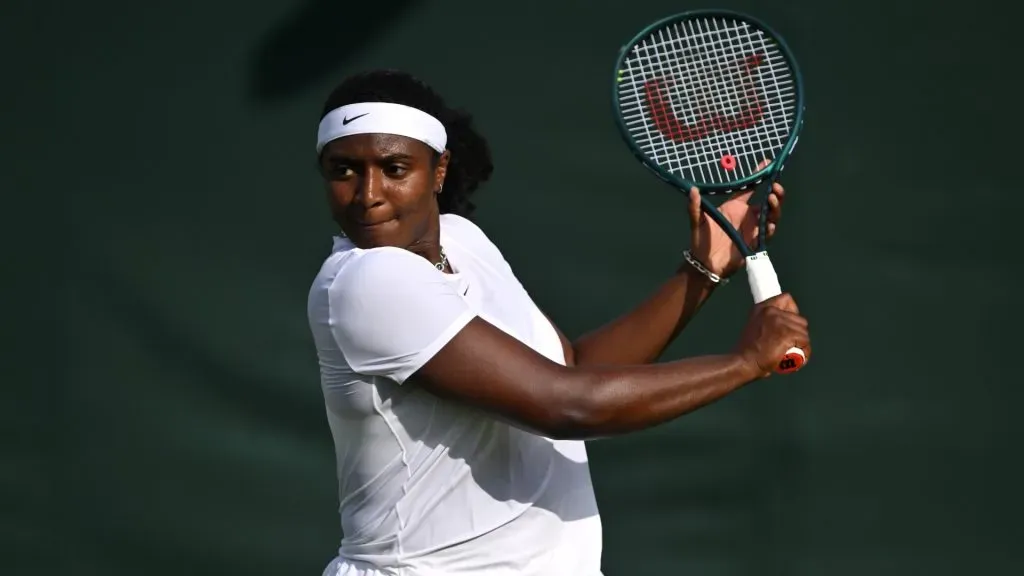 Hailey Baptiste plays a backhand during the Ladies’ Singles first round match on day two of The Championships Wimbledon 2025. (Source: Mike Hewitt/Getty Images)