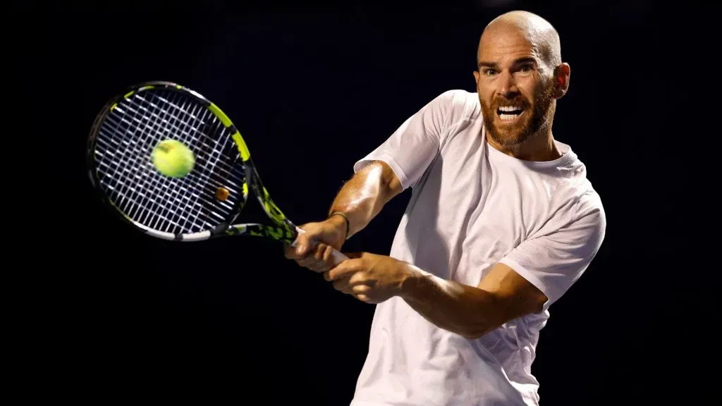 Adrian Mannarino returns a shot during their semi-finals match on day seven of the Winston-Salem Open in 2022. (Source: Jared C. Tilton/Getty Images)