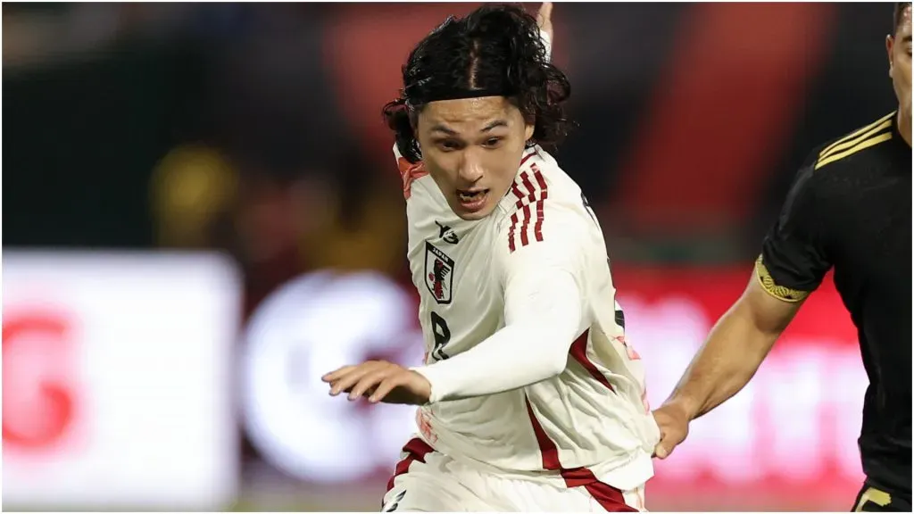 Takumi Minamino of Japan ā Ezra Shaw/Getty Images