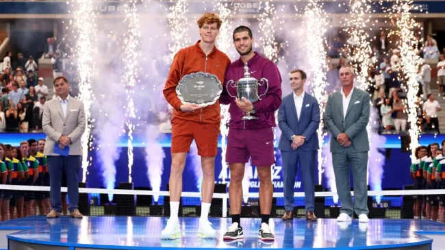 Jannik Sinner of Italy and Carlos Alcaraz of Spain pose after the US Open final. (Clive Brunskill/Getty Images)