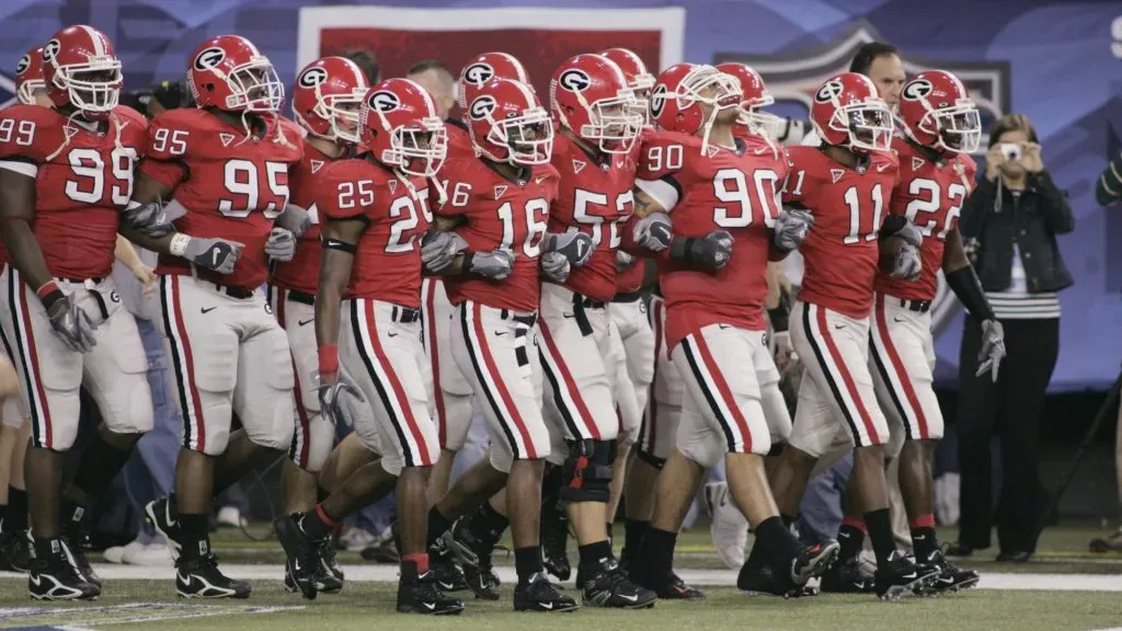 Georgia Bulldogs players walk onto the field in 2005. (Source: Grant Halverson/Getty Images)