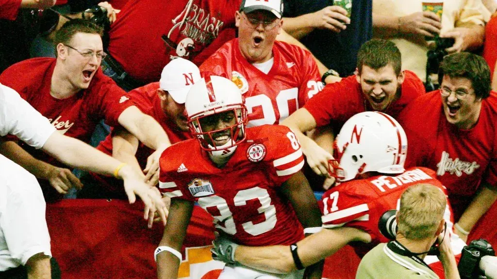 Fans celebrate with Nebraska’s Terrence Nunn and Todd Peterson in 2005. (Source: Darren Abate/Getty Images)
