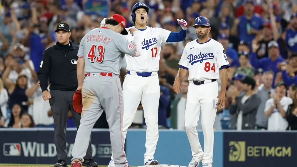Shohei Ohtani #17 of the Los Angeles Dodgers reacts after hitting an RBI single against the Cincinnati Reds. (Photo by Ronald Martinez/Getty Images)