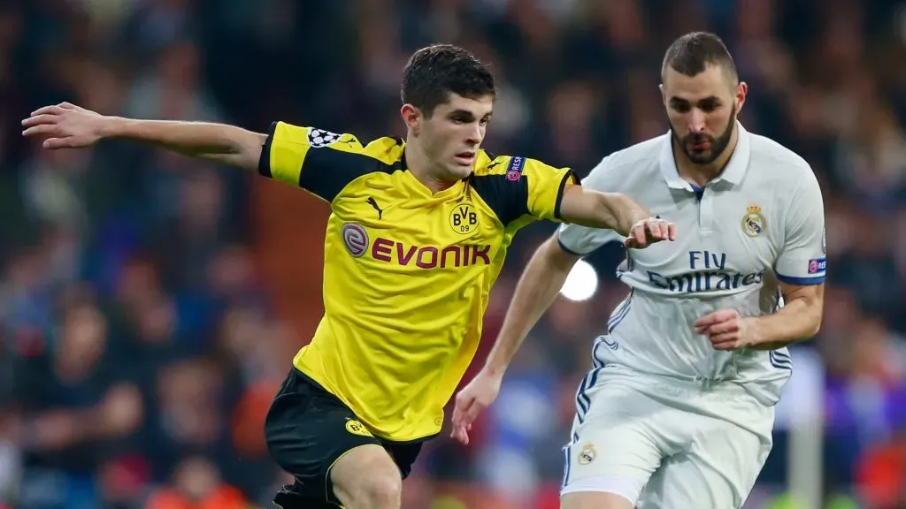 Christian Pulisic (left) during a Champions League game with Borussia Dortmund.