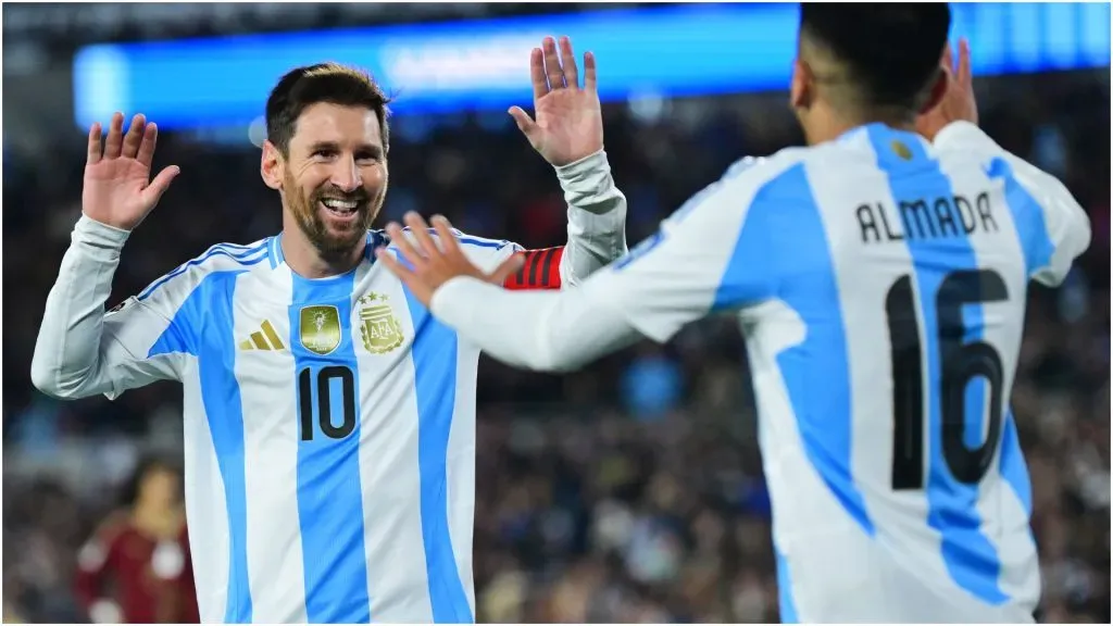 Lionel Messi of Argentina celebrates with teammate Thiago Almada ā Marcelo Endelli/Getty Images