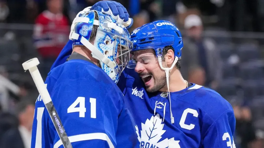 Auston Matthews hugs Anthony Stolarz after a win
