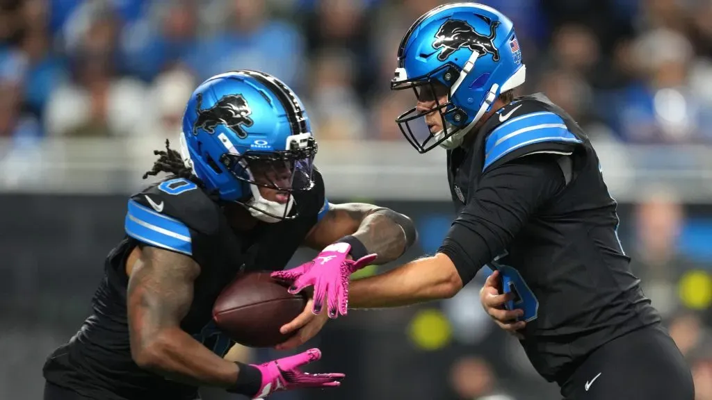 Jahmyr Gibbs with Jared Goff