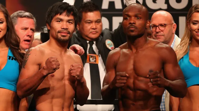 Manny Pacquiao and Timothy Bradley Jr. pose during their official weigh-in. Christian Petersen/Getty Images