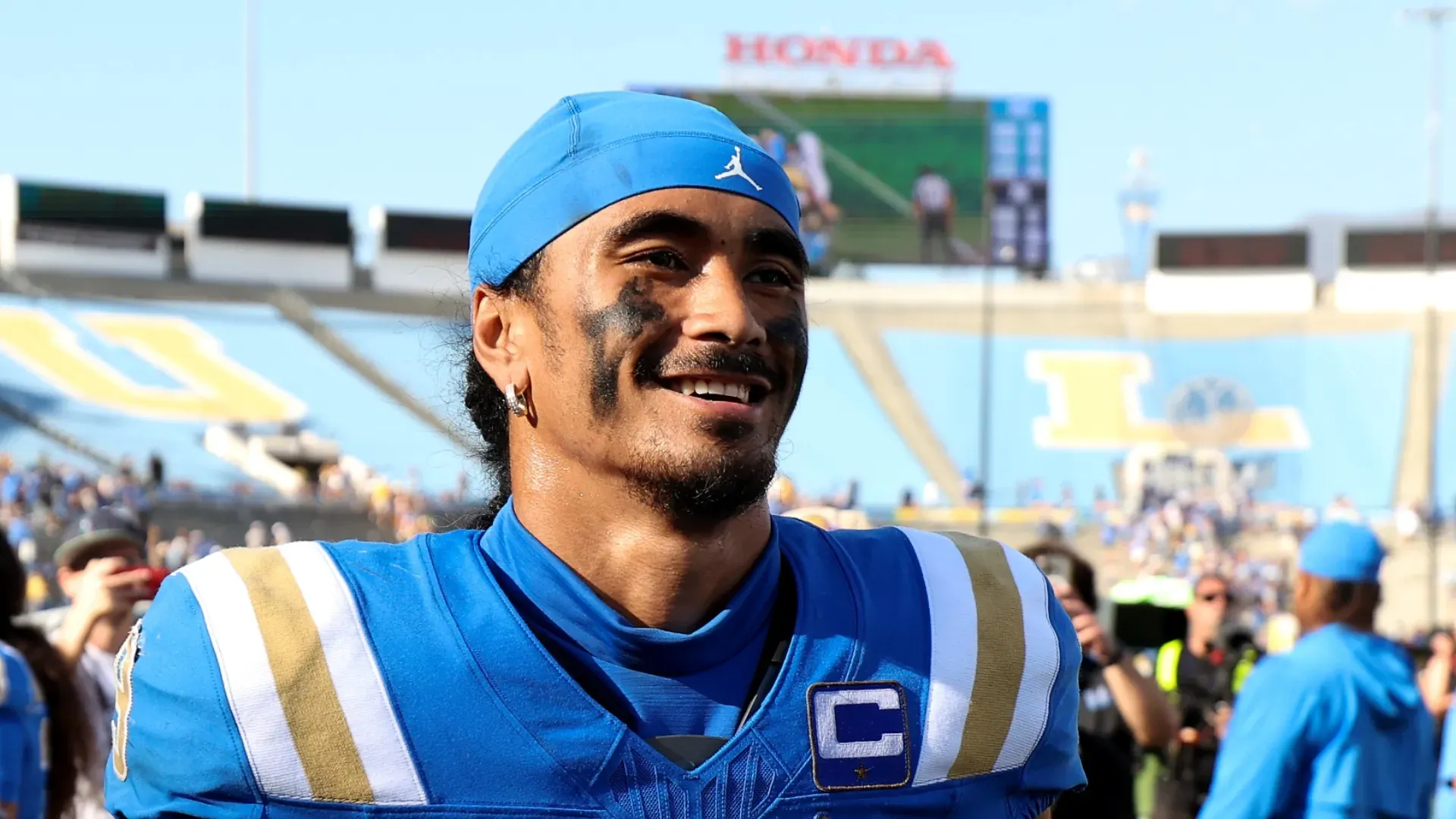 Nico Iamaleava smiling after a win