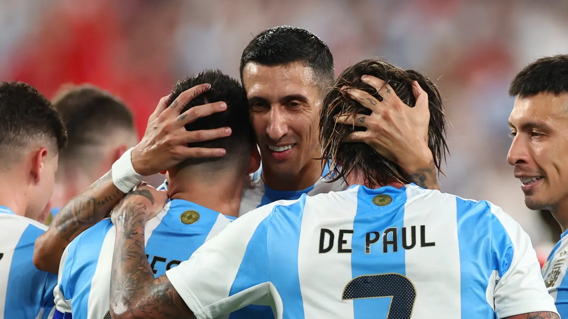 Angel Di Maria, Lionel Messi and Rodrigo De Paul of Argentina during a Copa America match.
