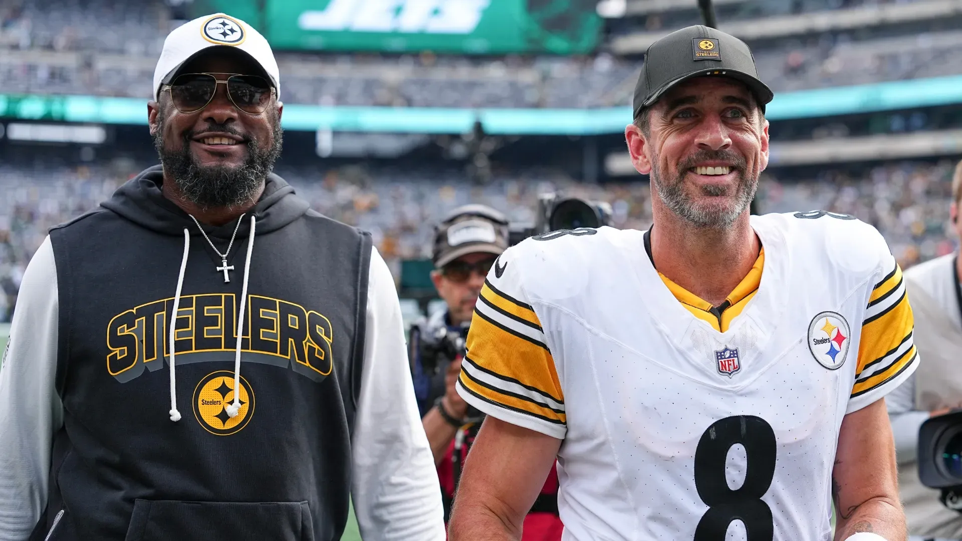 Mike Tomlin and Aaron Rodgers after a game in New York