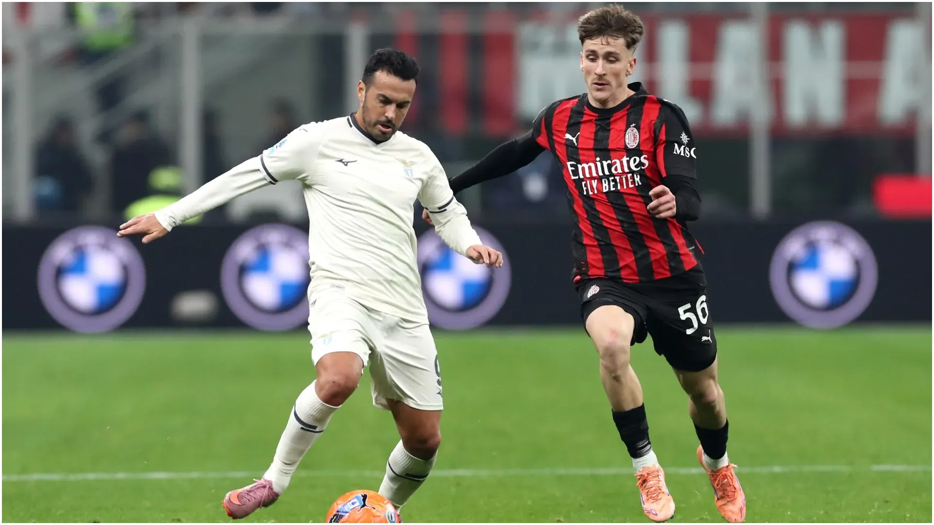 Pedro Rodriguez of Lazio is challenged by Alexis Saelemaekers of AC Milan ā Marco Luzzani/Getty Images