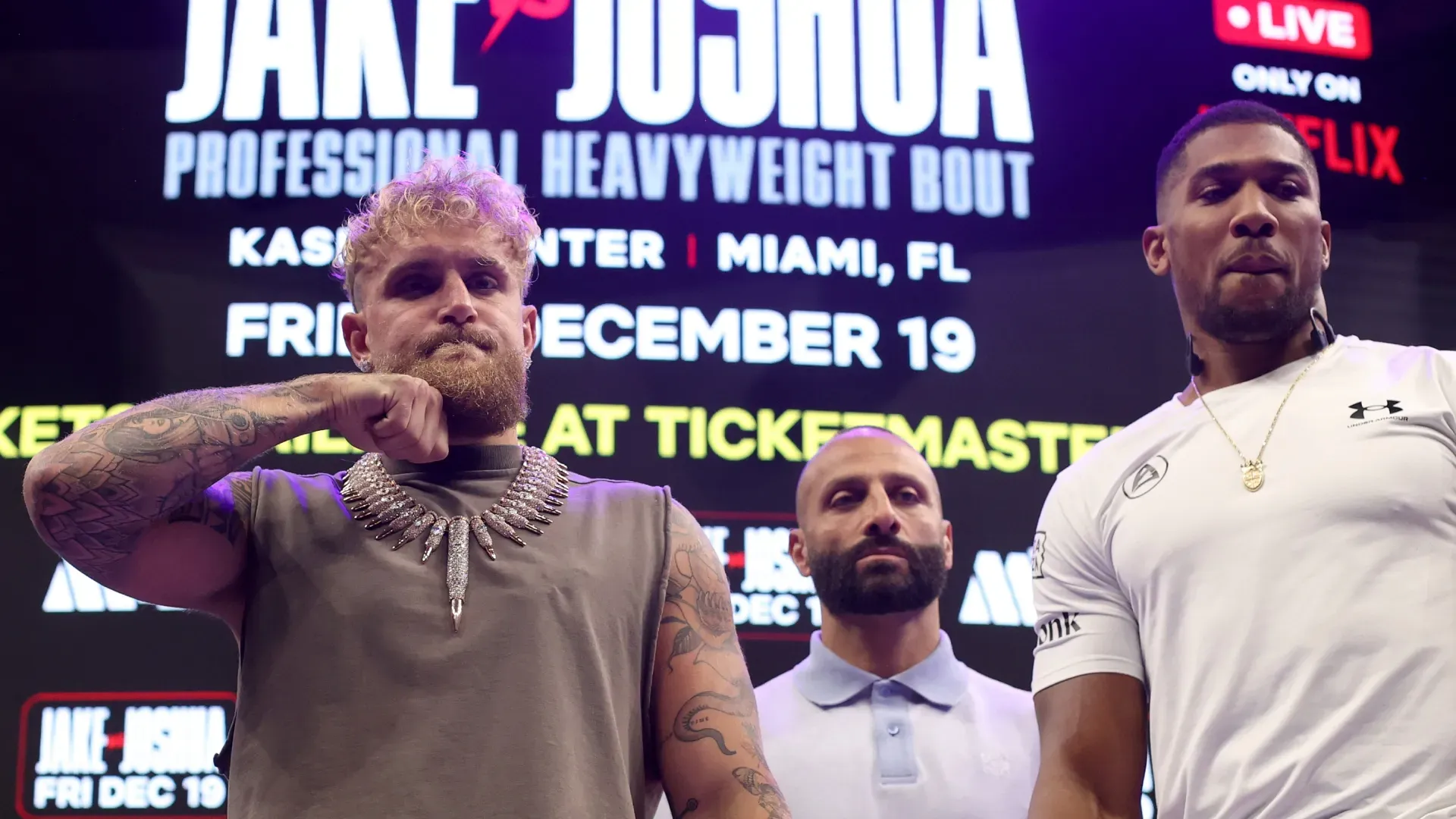Jake Paul and Anthony Joshua face off during the press conference. Leonardo Fernandez/Getty Images