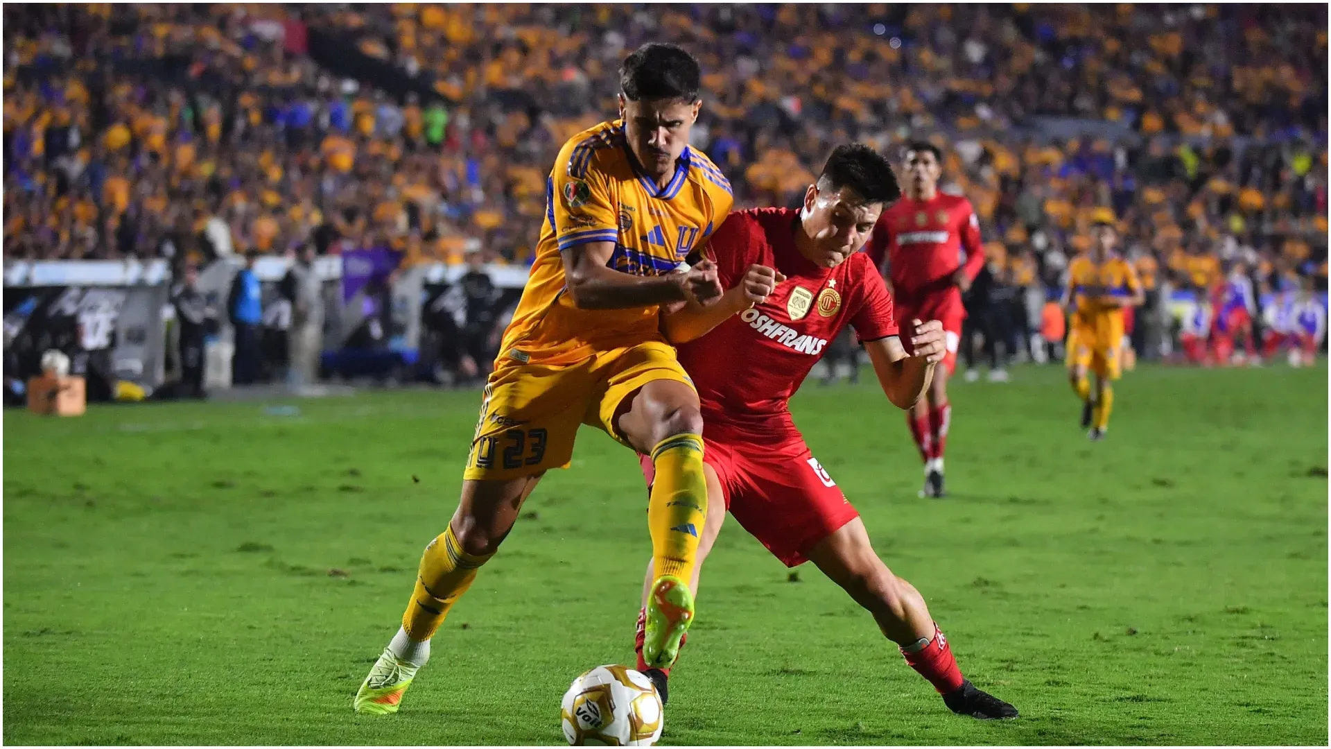 Romulo Zwarg of Tigres battles for possession against Franco Romero of Toluca – Azael Rodriguez/Getty Images
