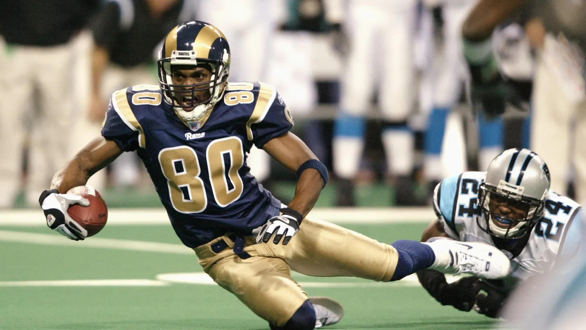 Isaac Bruce (Source: Doug Benc/Getty Images)