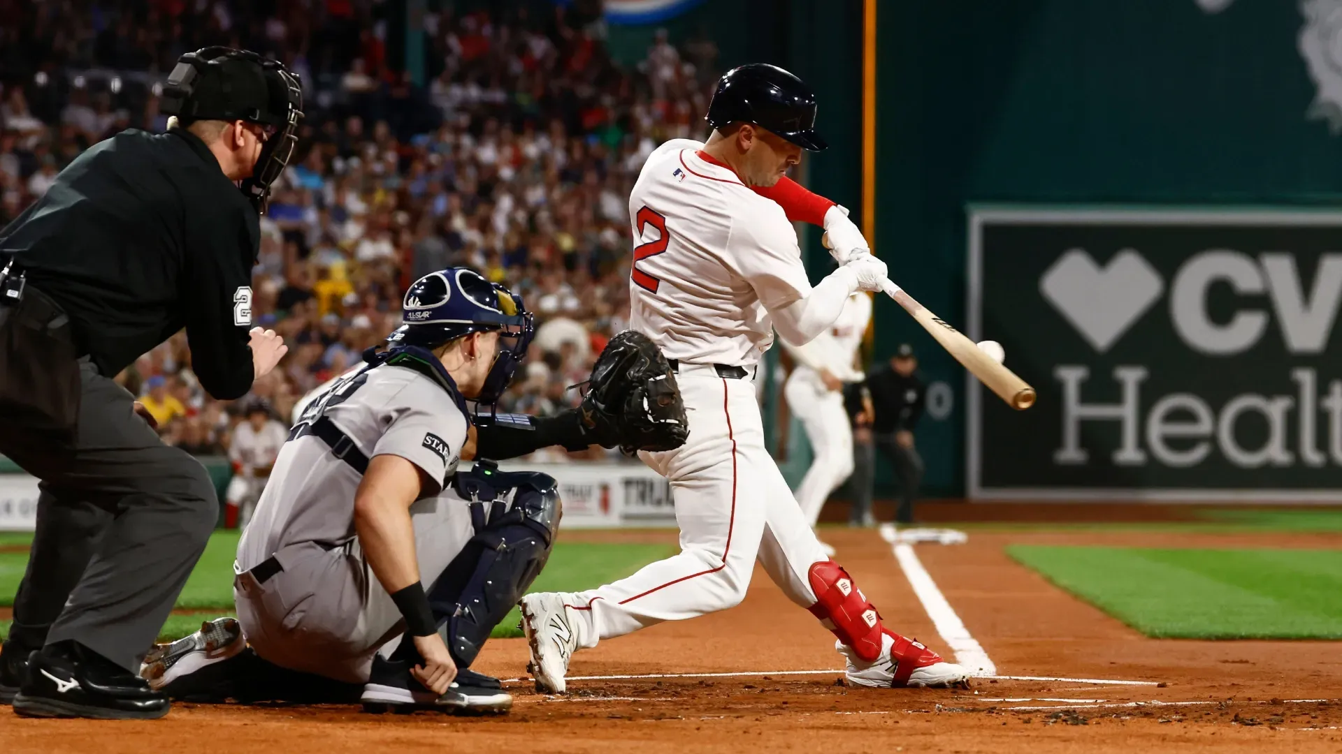 Alex Bregman #2 of the Red Sox connects on an RBI single against the Yankees. Winslow Townson/Getty Images