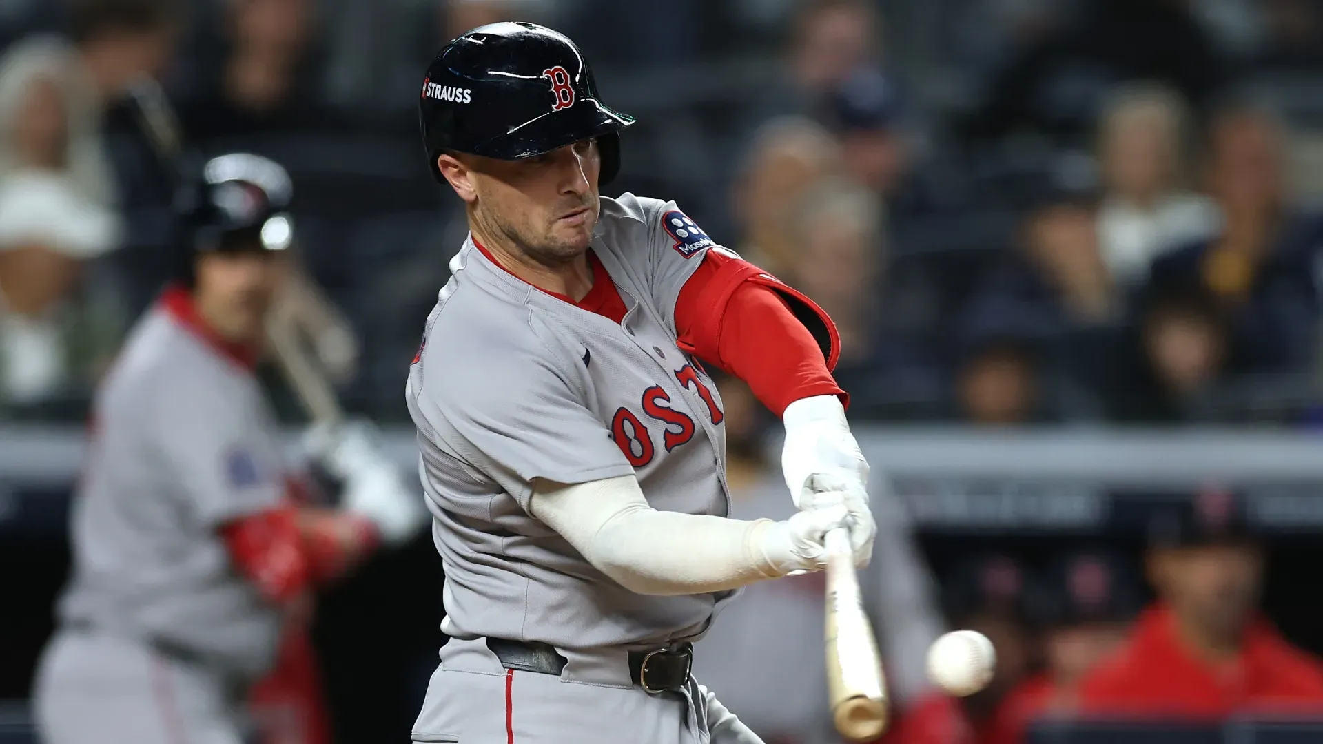 Alex Bregman #2 of the Boston Red Sox hits a single. Ishika Samant/Getty Images