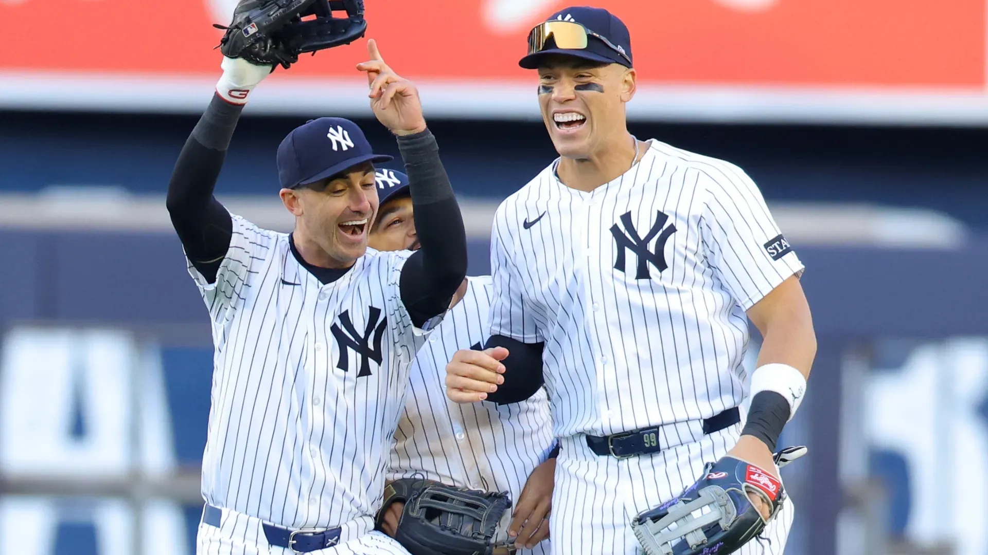 Cody Bellinger #35 of the New York Yankees with Aaron Judge #99 celebrate after a victory. Mike Stobe/Getty Images