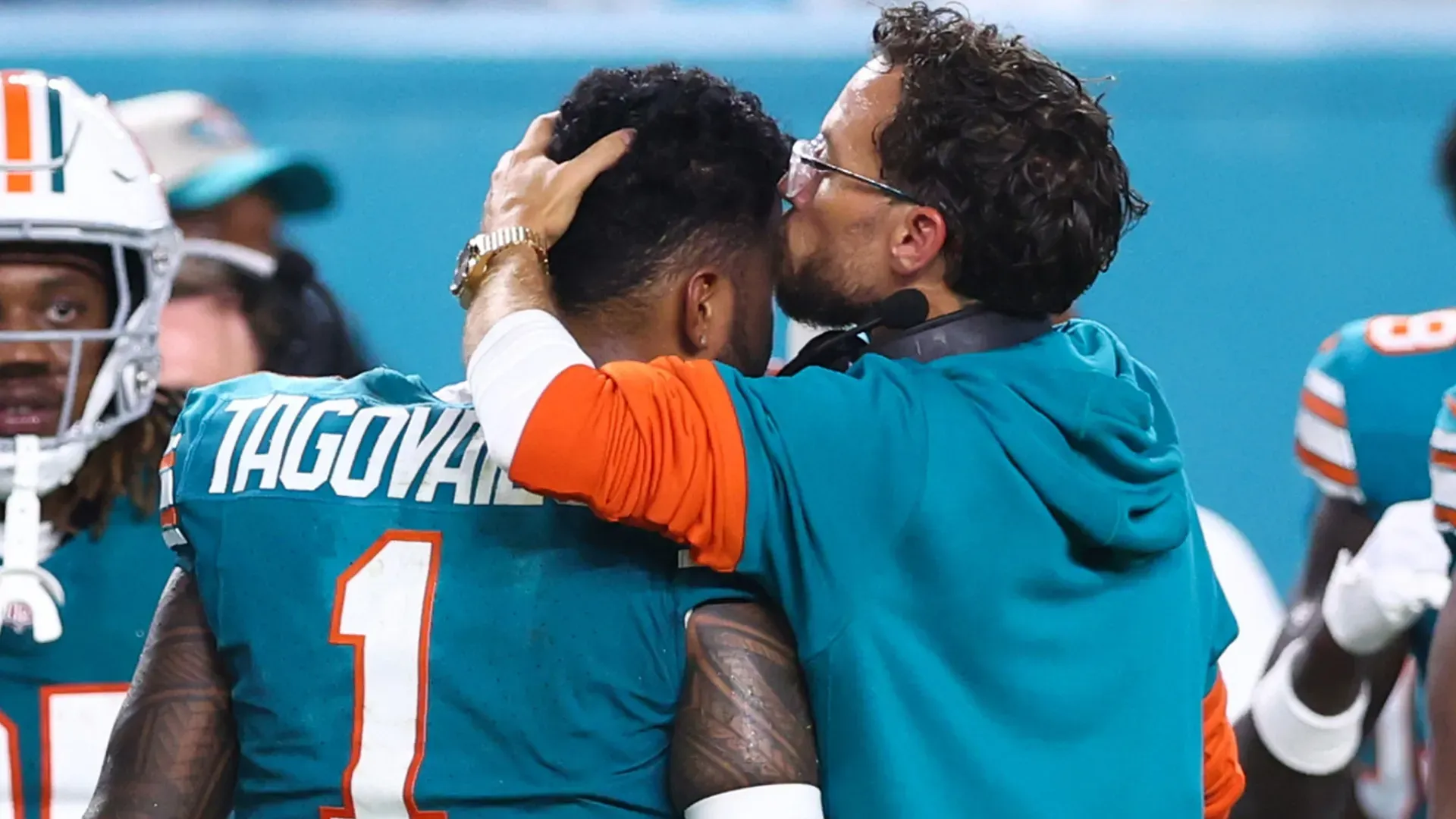 Mike McDaniel with Tua Tagovailoa