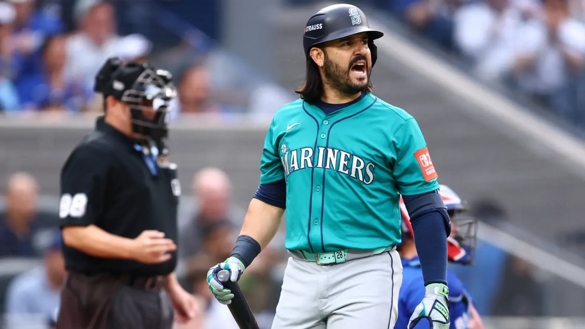 Eugenio Suarez #28 of the Mariners reacts after striking out. Vaughn Ridley/Getty Images