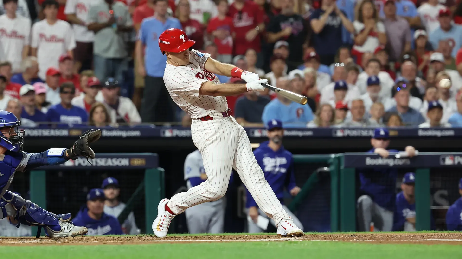 J.T. Realmuto #10 of the Philadelphia Phillies hits a triple. Hunter Martin/Getty Images