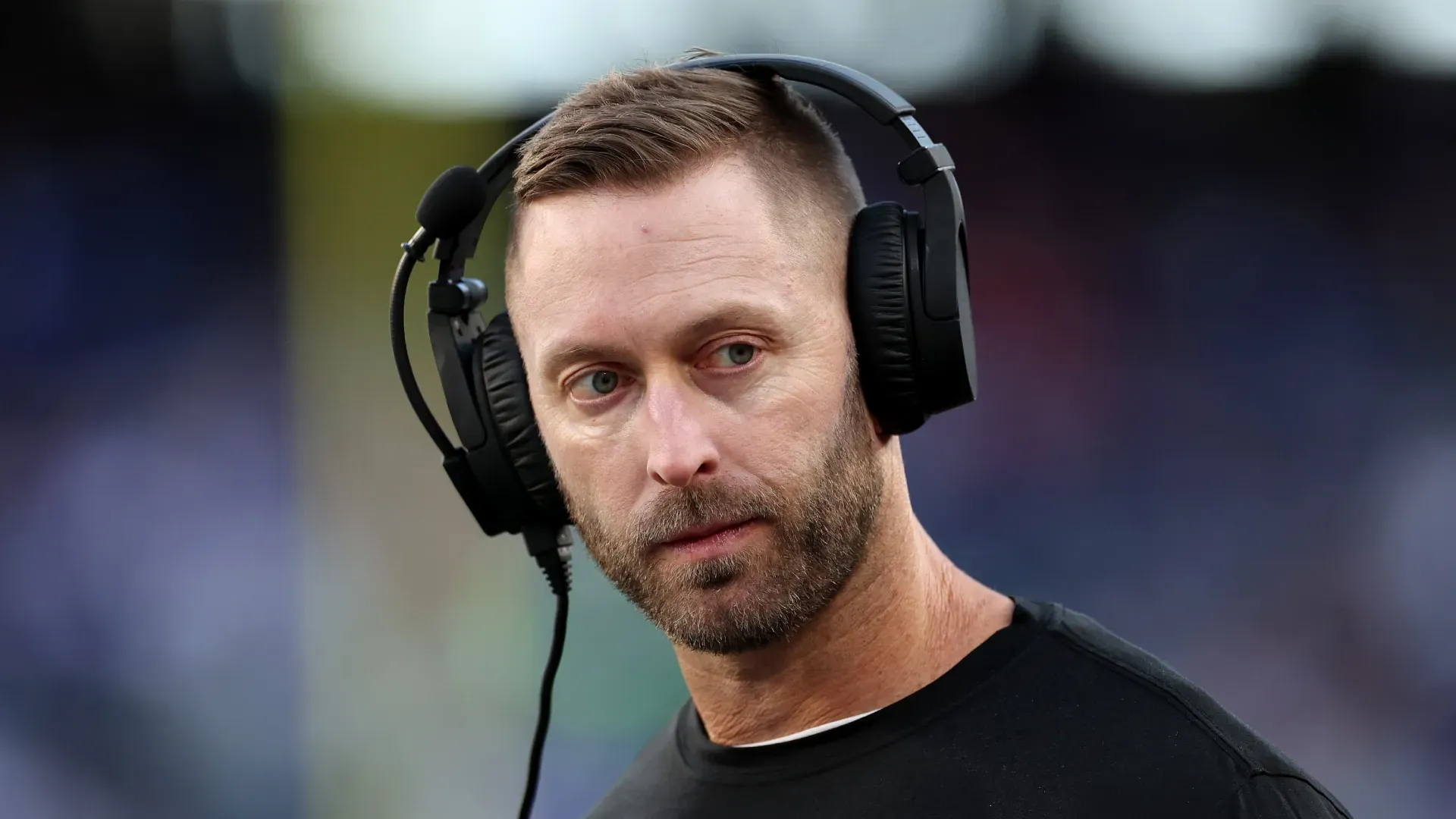 Kliff Kingsbury with headset