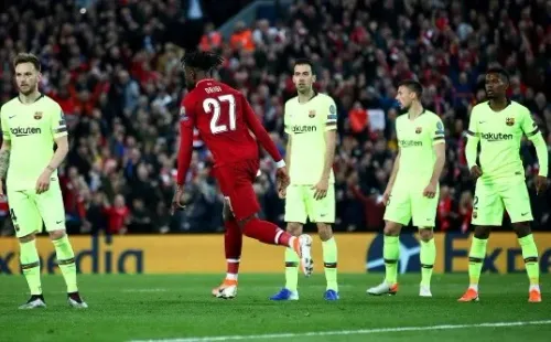 Origi celebra tras marcar el cuarto gol frente a Barcelona.