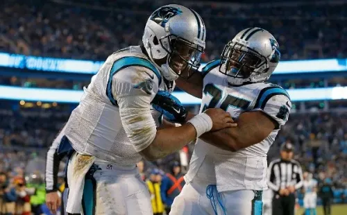 Cam Newton y Mike Tolbert