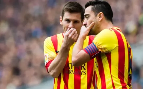Lionel Messi y Xavi Hernández