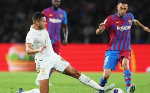 Sergio Busquets y Jack Rodwell