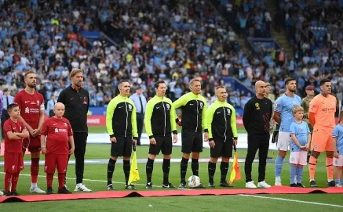Klopp y Guardiola, en reciente partido de Community Shield. Getty.
