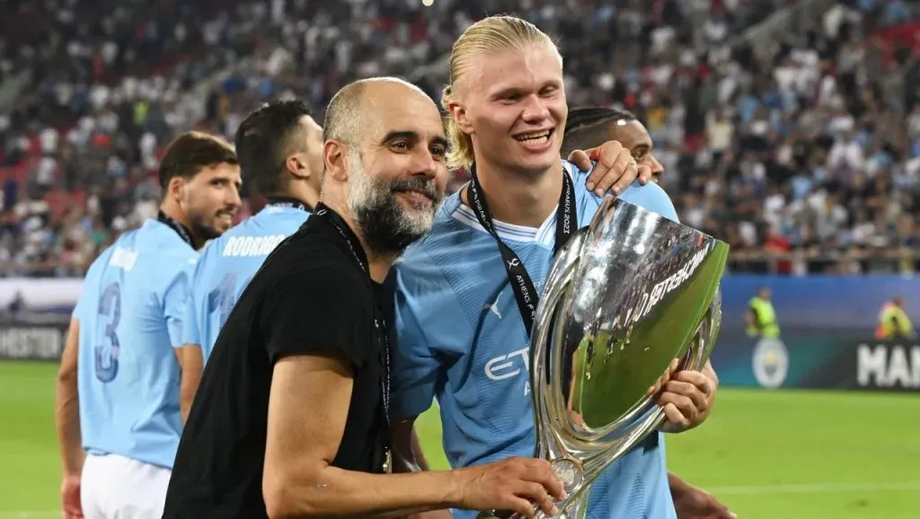 Erling Haaland, junto a Pep Guardiola (Getty Images).