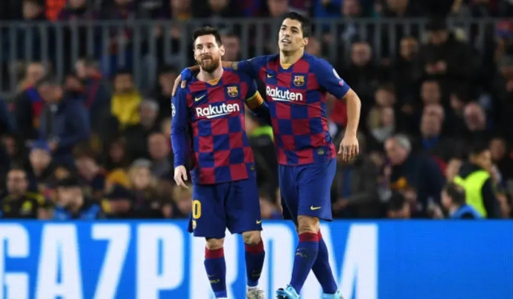 Luis Suárez y Lionel Messi festejando un gol en Barcelona: Getty Images