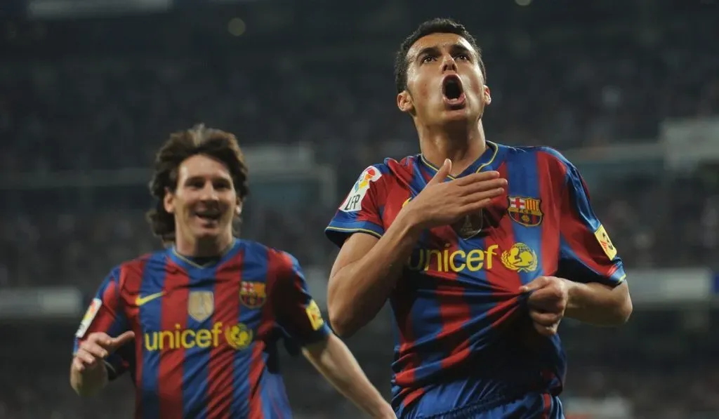 Pedro celebra con Lionel Messi su gol al Real Madrid en el 2009: Getty Images
